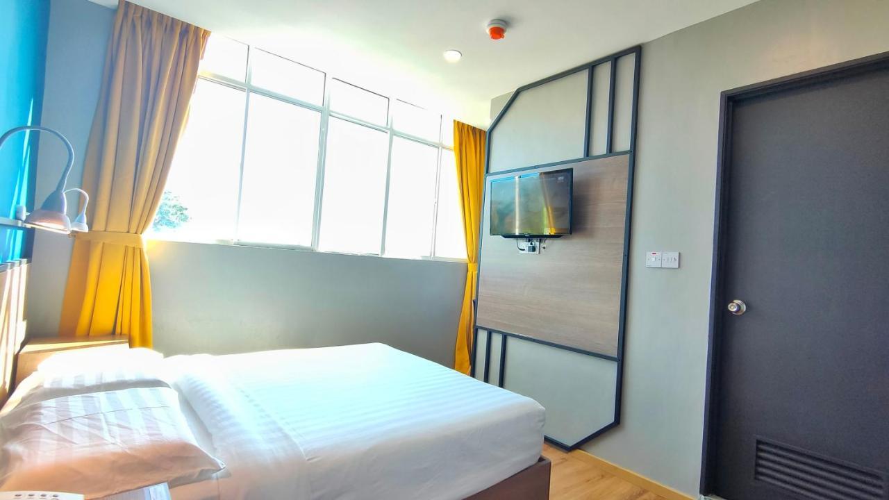 Uptown Hotel Semporna Extérieur photo