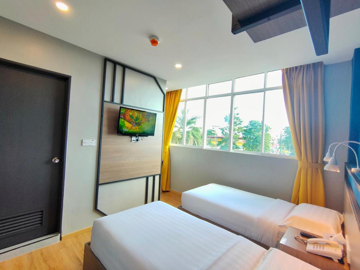 Uptown Hotel Semporna Extérieur photo