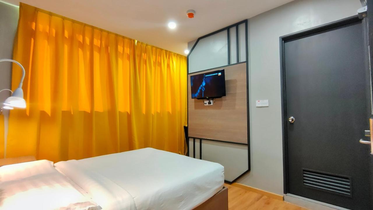 Uptown Hotel Semporna Extérieur photo