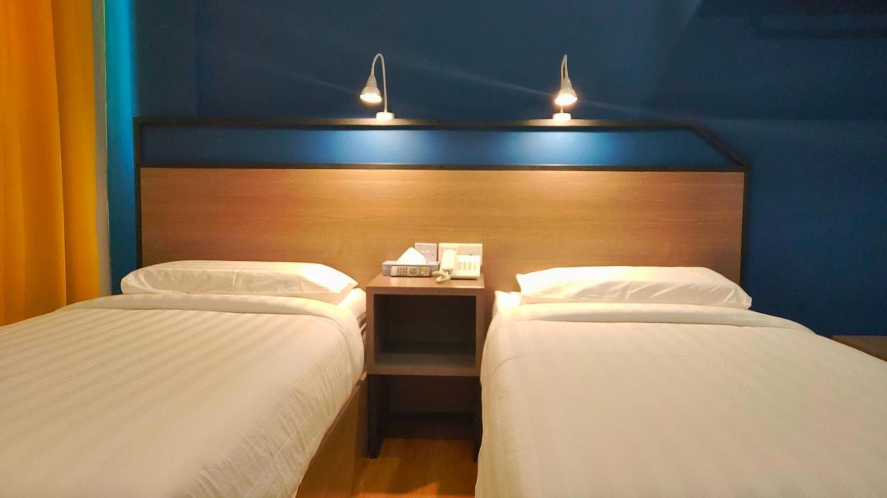 Uptown Hotel Semporna Extérieur photo