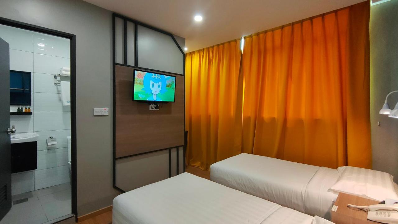 Uptown Hotel Semporna Extérieur photo
