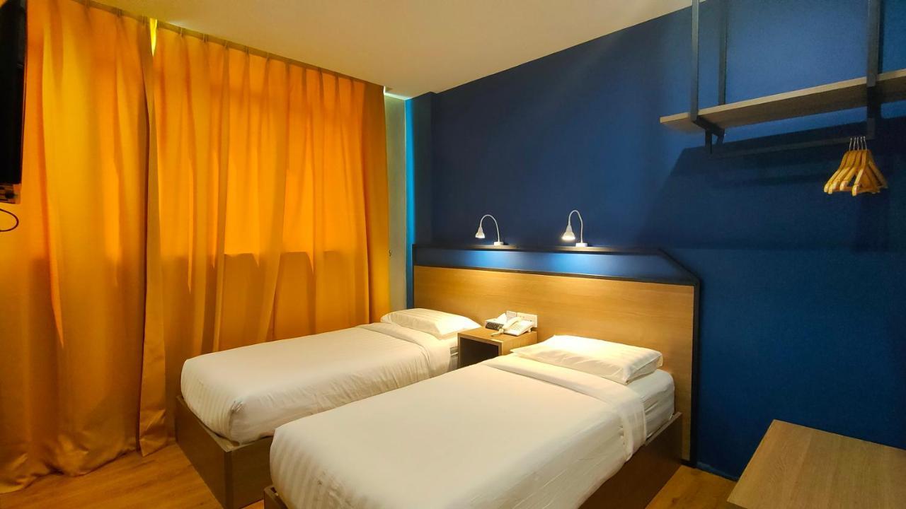 Uptown Hotel Semporna Extérieur photo