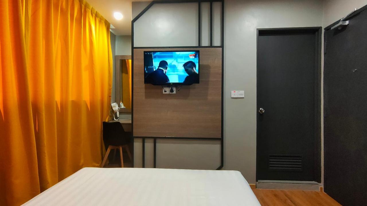 Uptown Hotel Semporna Extérieur photo